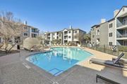 Austin apartment for rent - A pool surrounded by apartment buildings and a sun lounger.at Onyx183, Austin  