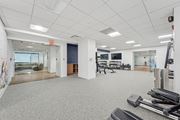 Alexandria apartment for rent - A gym with a variety of equipment including treadmills, weights and exercise machines at Sherwood at Southern Towers, Alexandria, 22311