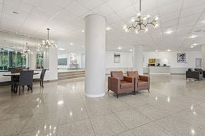 Alexandria apartment for rent - A Spacious Lobby With a Chandelier at Ashlawn at Southern Towers, Alexandria, VA, 22311
