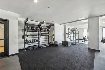 Fitness center with weight lifting equipments