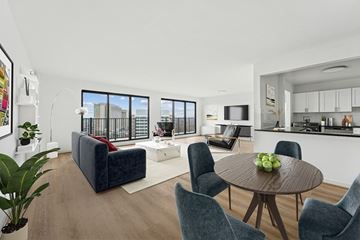 Alexandria apartment for rent - A living room with a couch, chairs, and a table with a bowl of fruit on it.