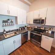 Inglewood apartment for rent - Kitchen with stove top oven at Sora Apartments, California