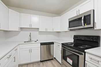 Kitchen with white cabinetry