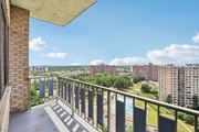 Alexandria apartment for rent - A balcony with a view of a pool and buildings.