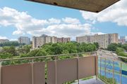 Alexandria apartment for rent - A balcony with a view of a cityscape and a pool.