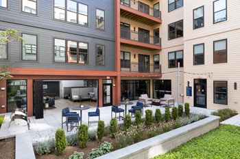 Elevated courtyard with grilling stations