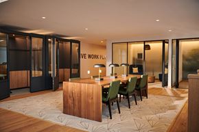Burlington apartment for rent - a large conference room with a wooden table and chairs