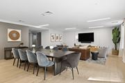Cambridge apartment for rent - A modern dining room with a large table and grey chairs.