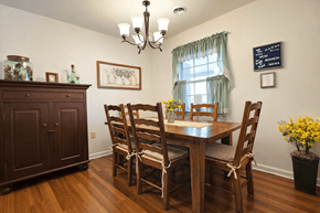 Sinking Spring apartment for rent - A dining room with a wooden table and chairs.