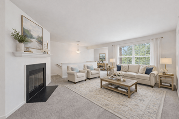 Reading apartment for rent - A living room with a fireplace and a painting on the wall.