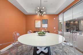 Gaithersburg apartment for rent - A modern dining room with a round table and chairs.