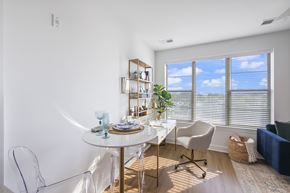 Germantown apartment for rent - A dining room with a white table and chairs.