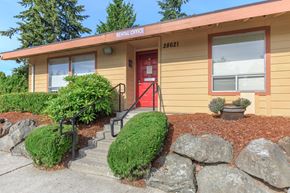 Federal Way apartment for rent - A building with a red door and a sign that says "Rental Office" on the top.