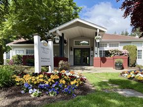 Gig Harbor apartment for rent - The front of a building with a sign that says Forest Grove.