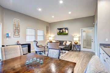 Kent apartment for rent - A well-lit living room with a dining table and chairs.