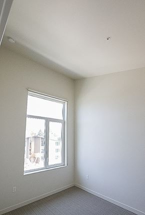 Federal Way apartment for rent - A room with a window and a view of a building outside.
