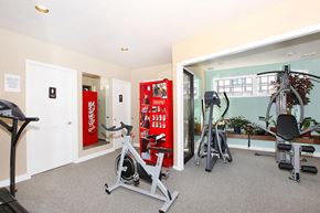 Kent apartment for rent - A gym with a Coca Cola vending machine.