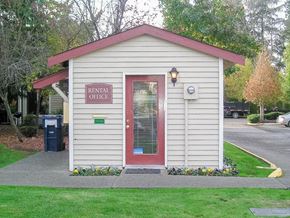 Kent apartment for rent - A small building with a red door and a sign that says RENTAL OFFICE.