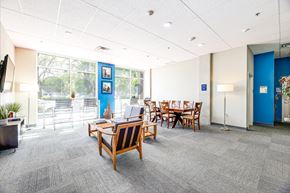 Renton apartment for rent - A conference room with a long table and chairs.