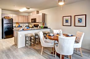 Renton apartment for rent - A kitchen with a table and chairs.