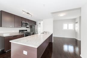 Chicago apartment for rent - a large kitchen with a marble counter top and