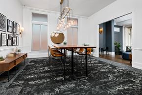 Chicago apartment for rent - a dining room with a table and chairs and a chandelier