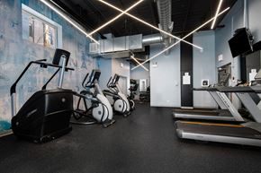 Chicago apartment for rent - a group of exercise equipment in a gym