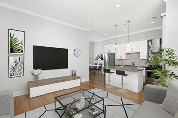 Chicago apartment for rent - a living room with a couch and a table
