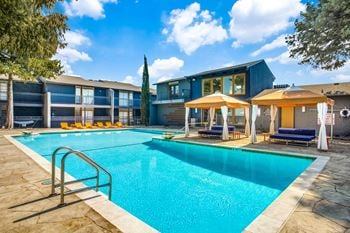Pool cabanas and outdoor kitchen