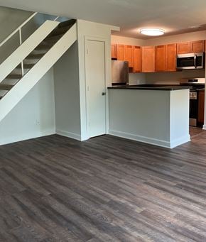 Rockville apartment for rent - A kitchen with wooden floors and white walls.