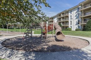 Silver Spring apartment for rent - A playground with a slide and a climbing frame.