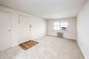 Silver Spring apartment for rent - A room with a window and a radiator on the wall.