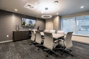 Bellevue apartment for rent - A conference room with a long table and chairs.