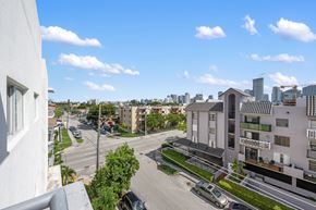 Miami apartment for rent - A view of a city street from a high vantage point.