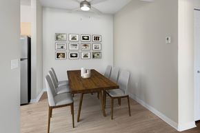 Turlock apartment for rent - A dining room with a table and chairs.