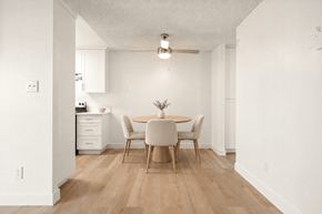 El Cajon apartment for rent - A dining room with a table and chairs.