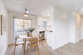 Lakeside apartment for rent - A dining room with a table and chairs.