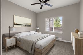 Olympia apartment for rent - A bedroom with a bed, nightstand, and a painting on the wall.