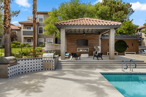 Las Vegas apartment for rent - A pool area with a pavilion and a pool.