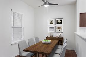 Gresham apartment for rent - A dining room with a wooden table and chairs.