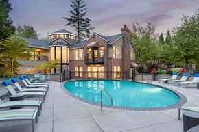 Gresham apartment for rent - A large house with a pool in the backyard.