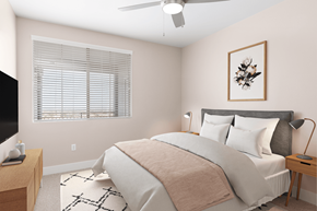 Las Vegas apartment for rent - A bedroom with a large bed and a ceiling fan.