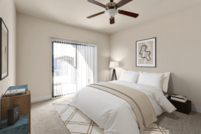 Henderson apartment for rent - A bedroom with a large bed and a ceiling fan.