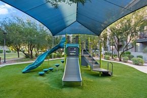 Phoenix apartment for rent - A playground with a slide and a ramp.