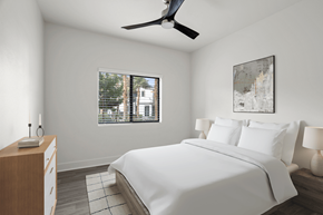 Las Vegas apartment for rent - A bedroom with a large bed and a ceiling fan.
