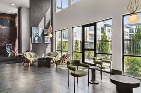 Fort Worth apartment for rent - A modern living room with a view of the city.