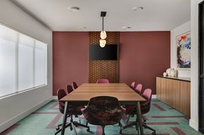 Fort Worth apartment for rent - A conference room with a long table and chairs.