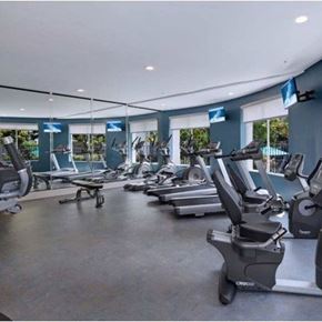 Santa Clarita apartment for rent - A gym with treadmills and exercise equipment.