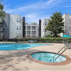Santa Clarita apartment for rent - A swimming pool in front of apartment buildings.