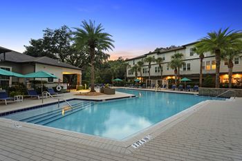 Resort-style saltwater pool overlooking nature preserve